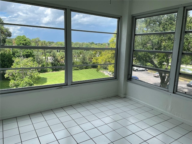 unfurnished sunroom featuring a wealth of natural light