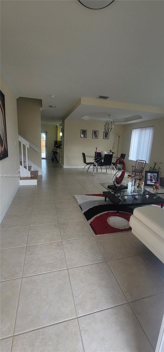 interior space featuring plenty of natural light and light tile patterned flooring