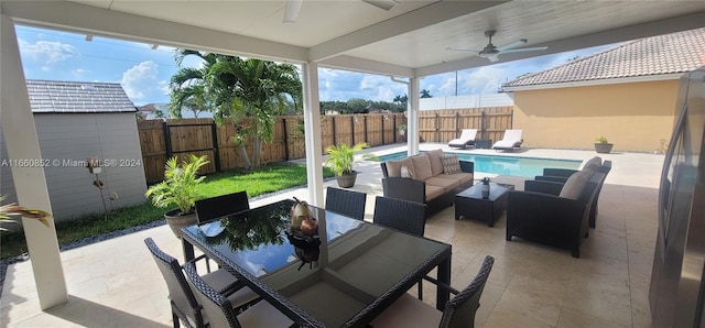 view of patio / terrace with an outdoor living space and ceiling fan