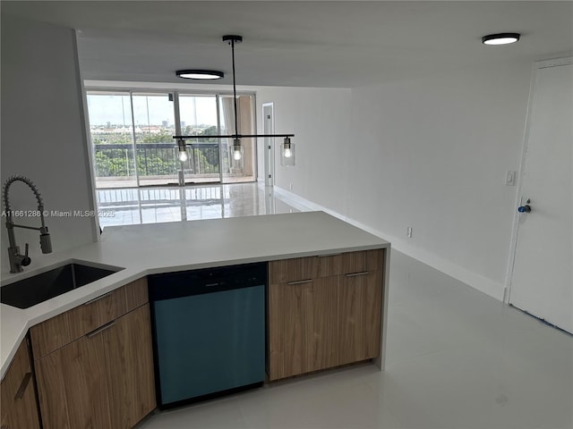 kitchen with hanging light fixtures, dishwasher, sink, and light tile patterned flooring