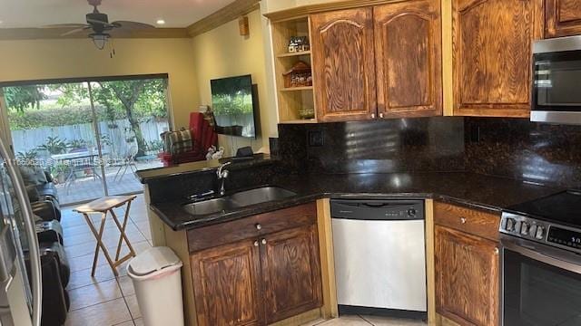 kitchen featuring light tile patterned flooring, open shelves, appliances with stainless steel finishes, a sink, and a peninsula