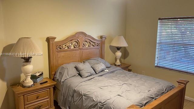 bedroom with baseboards