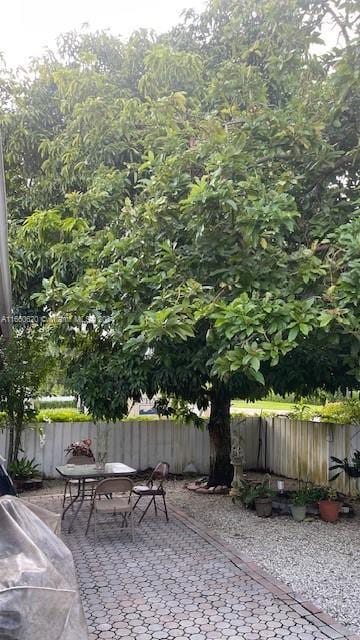 view of patio / terrace with fence and outdoor dining area
