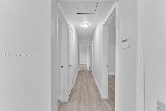 full bathroom featuring shower / bath combination with curtain, vanity, hardwood / wood-style floors, and toilet