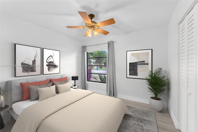 bedroom featuring ceiling fan and light wood-type flooring