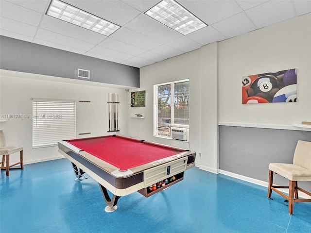 playroom with cooling unit, pool table, concrete floors, and a paneled ceiling