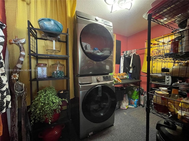 washroom featuring a textured ceiling, carpet floors, and stacked washer and clothes dryer