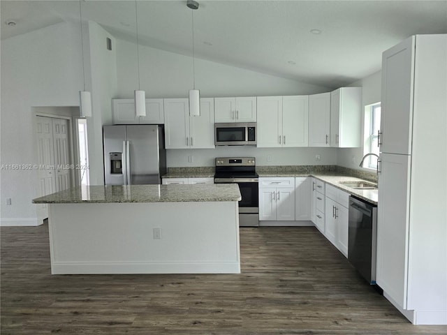 kitchen featuring white cabinets, appliances with stainless steel finishes, dark wood-type flooring, and sink