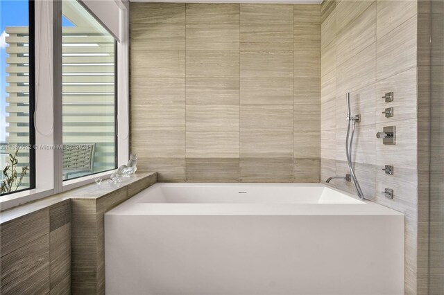 4701 N Meridian Ave Unit 510, Miami Beach, FL 33140 - full bathroom with a garden tub