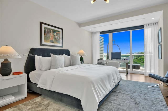 bedroom featuring wood-type flooring