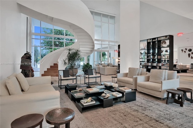 living room with a towering ceiling