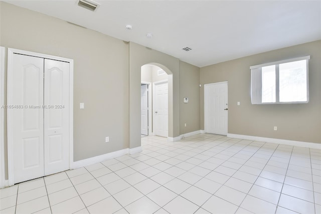 view of tiled spare room