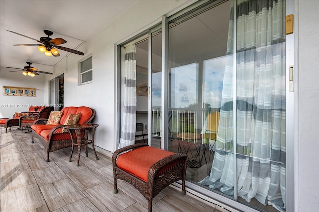 balcony featuring ceiling fan