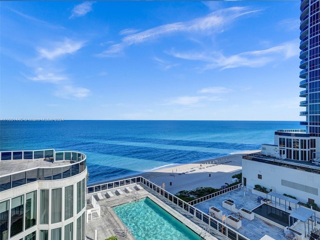 property view of water featuring a beach view