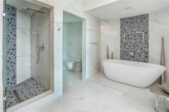 bathroom featuring tile walls, toilet, and plus walk in shower