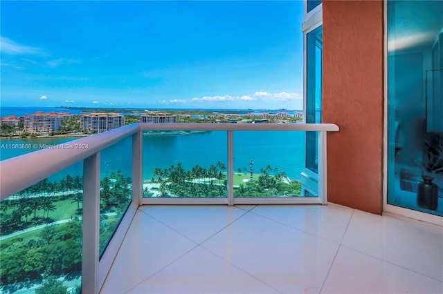 balcony featuring a water view