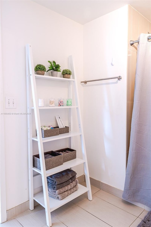 interior space with tile patterned floors