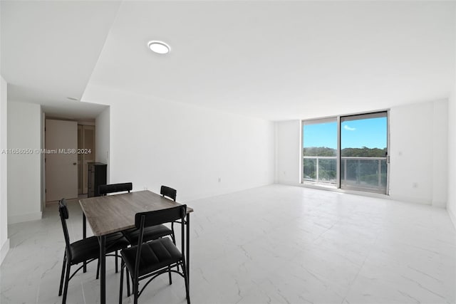 dining room with expansive windows