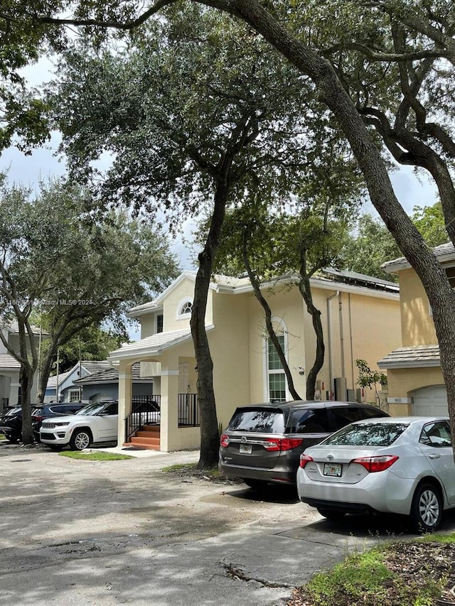 view of front of property with a garage and a porch