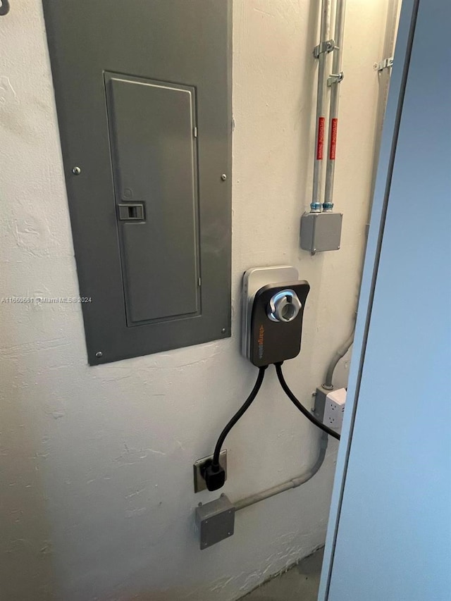 utility room featuring electric panel