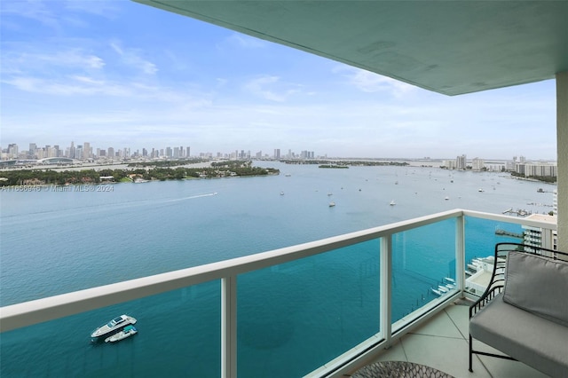 balcony featuring a water view