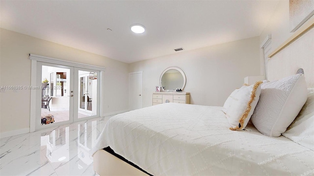 bedroom featuring access to exterior and french doors