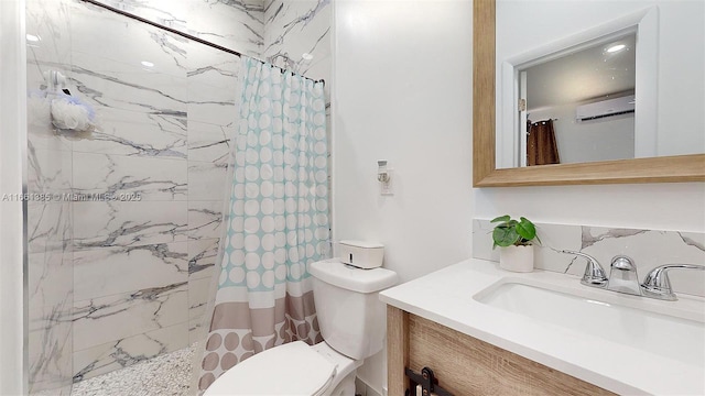 bathroom with a shower with shower curtain, vanity, toilet, and a wall mounted AC