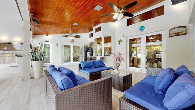 view of patio with french doors, an outdoor living space, and ceiling fan