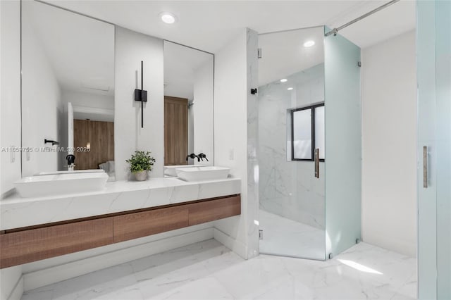 full bath featuring vanity, visible vents, and a marble finish shower