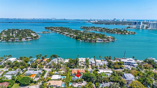 aerial view featuring a water view and a residential view