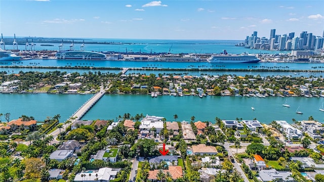 bird's eye view featuring a water view and a residential view