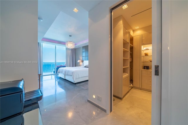 living room featuring floor to ceiling windows