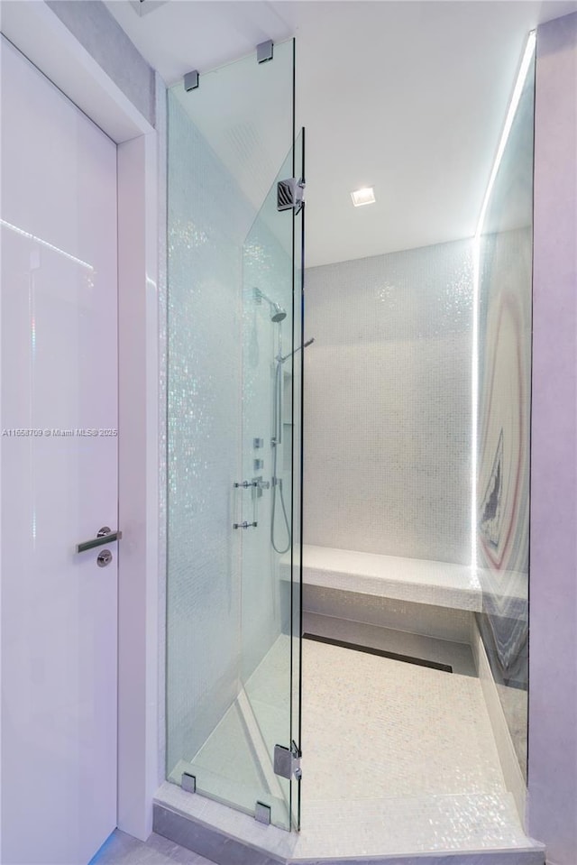 full bath featuring a stall shower