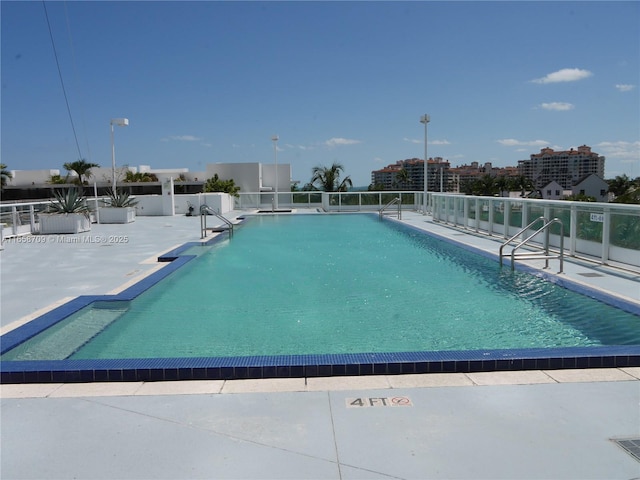 pool featuring a patio