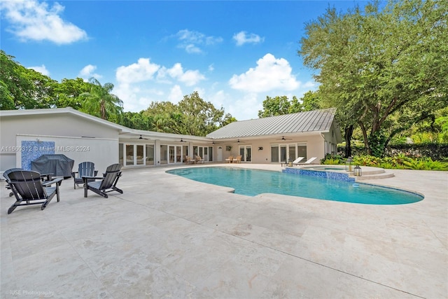 view of pool featuring a patio area