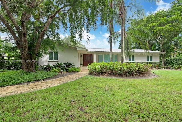 view of front of home with a front yard