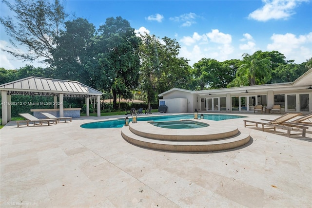 view of pool with a patio and a gazebo