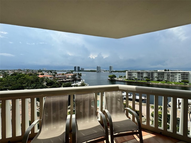 balcony featuring a water view