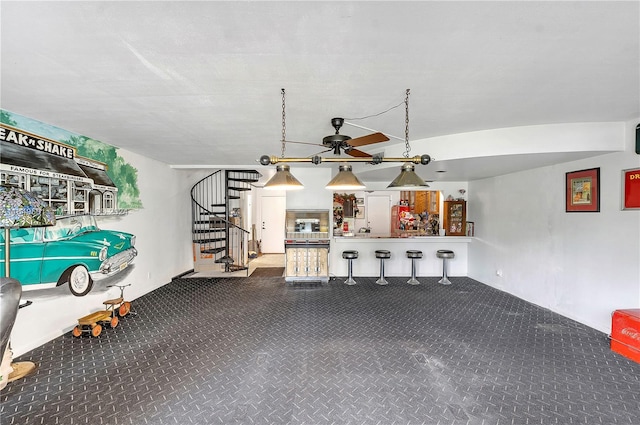 garage featuring ceiling fan