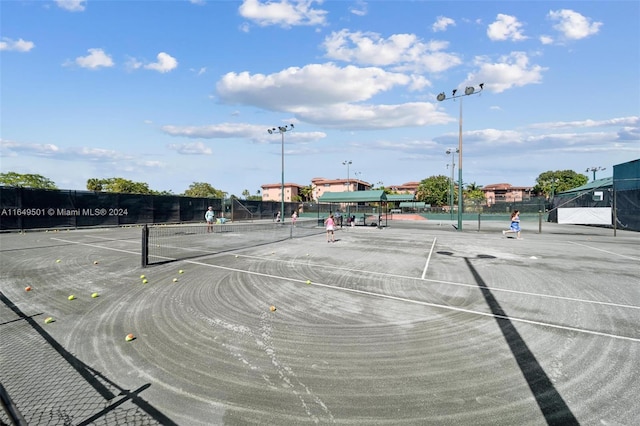 620 Tennis Club Dr Unit 111, Fort Lauderdale, FL 33311 - view of sport court featuring fence