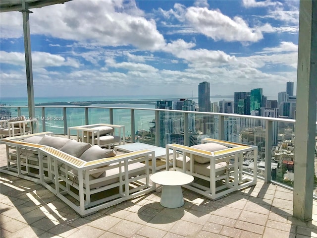 balcony featuring a water view