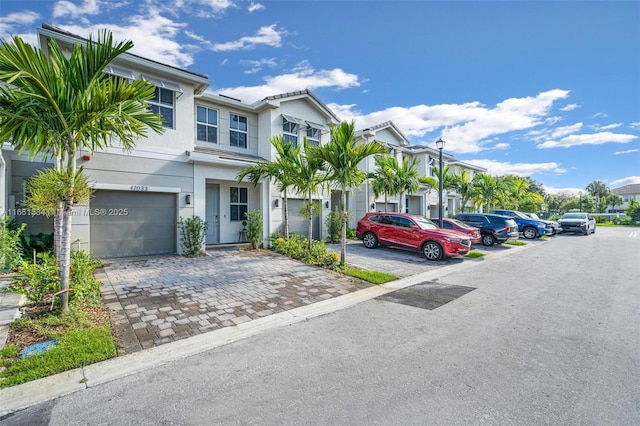 townhome / multi-family property with stucco siding