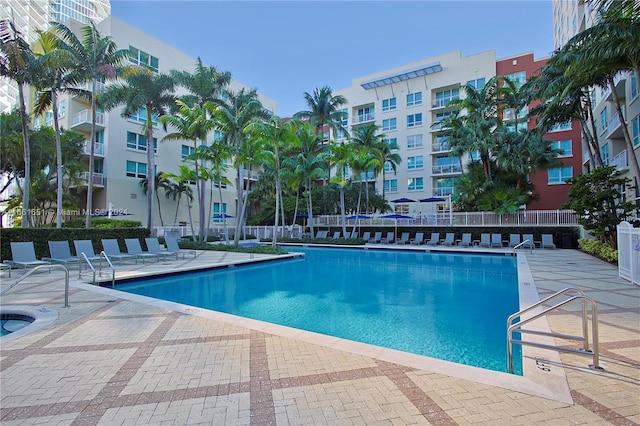 view of swimming pool featuring a patio