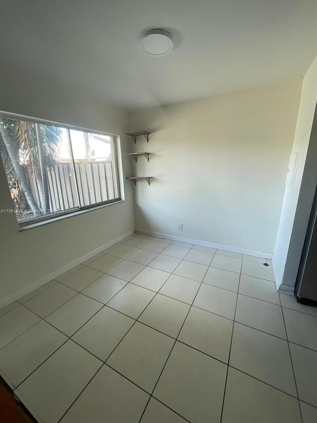 view of tiled spare room