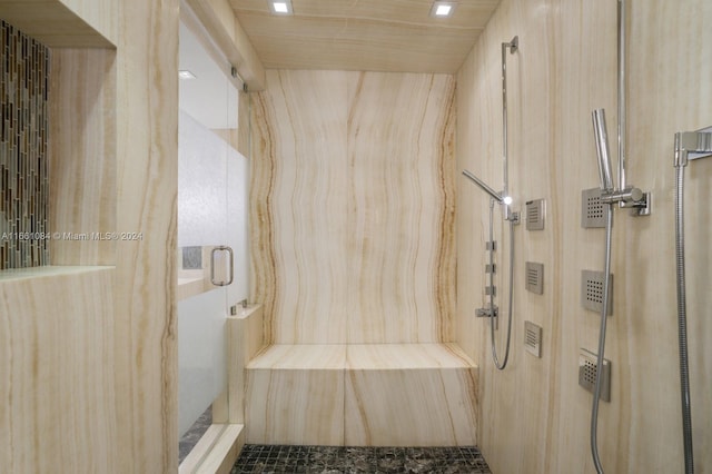 bathroom featuring an enclosed shower