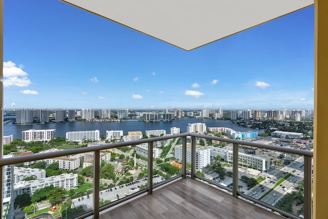 balcony featuring a water view