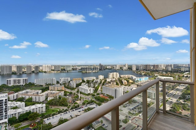 balcony featuring a water view