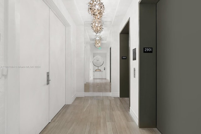 hallway featuring light wood-type flooring