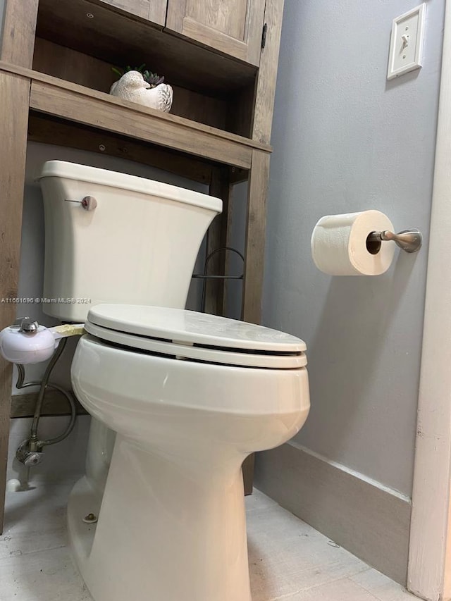 bathroom featuring toilet