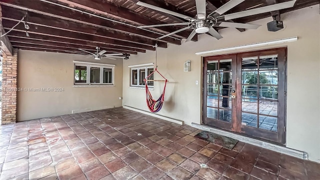 view of patio with french doors and ceiling fan